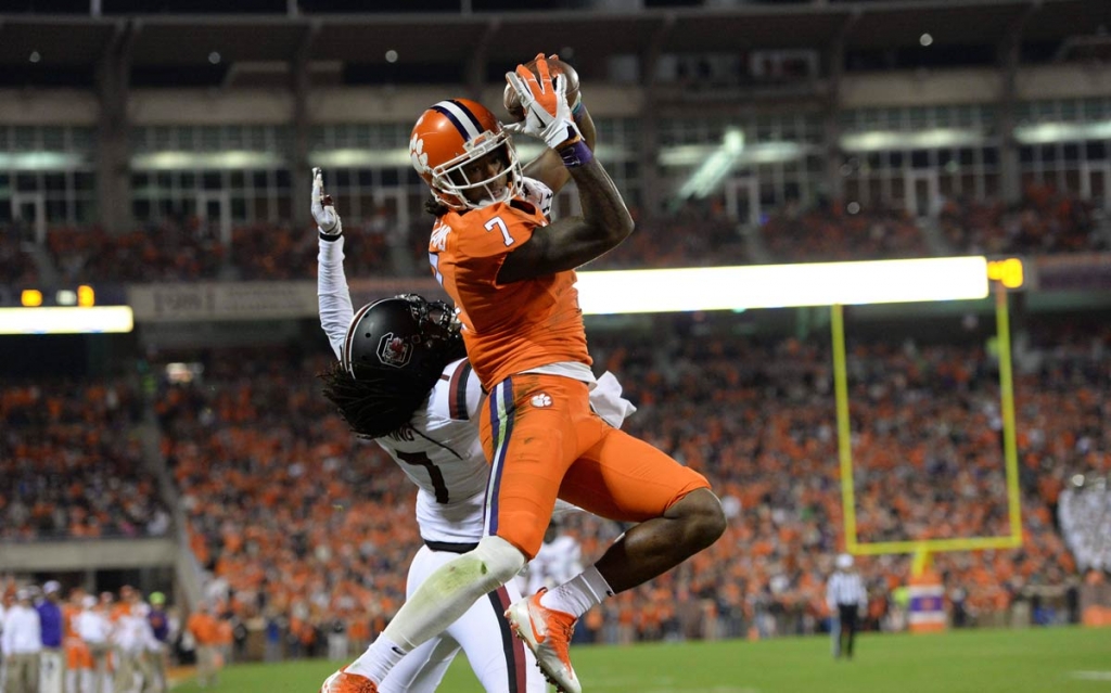 Clemson's Mike Williams pulls in a touchdown reception while defended by South Carolina's Jamarcus King during the first half of an NCAA college football game Saturday Nov. 26 2016 in Clemson S.C