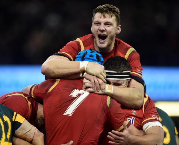 Welsh players celebrate a try against South Africa