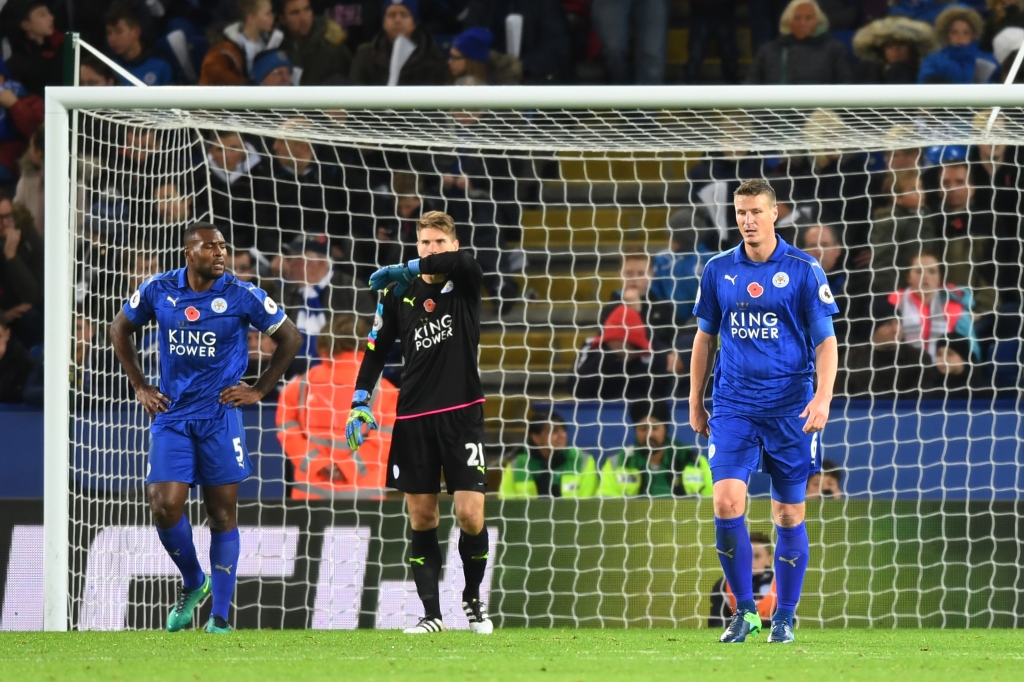 LEICESTER ENGLAND- NOVEMBER 06 Wes Morgan Ron Robert Zieler and Robert Huth of Leicester City look on after conceding their second goal during the Premier League match between Leicester City and West Bromwich Albion at The King Power Stadium