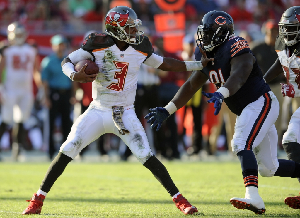 Tampa Bay Buccaneers quarterback Jameis Winston is sacked by Chicago Bears nose tackle Eddie Goldman during the fourth quarter of an NFL football game Sunday Nov. 13 2016 in Tampa Fla