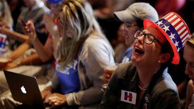 Supporters of US Democratic Presidential candidate Hillary Clinton react as a state is called in favor of her opponent President-elect Donald Trump in Sydney Australia