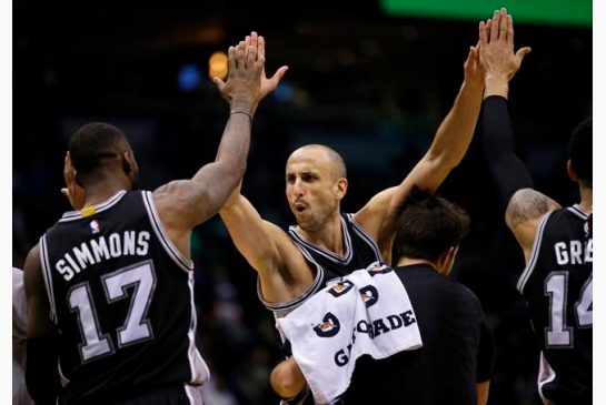 San Antonio Spurs Manu Ginobili middle reacts after an NBA basketball game against the Milwaukee Bucks Monday Dec. 5 2016 in Milwaukee. The Spurs won 97-96