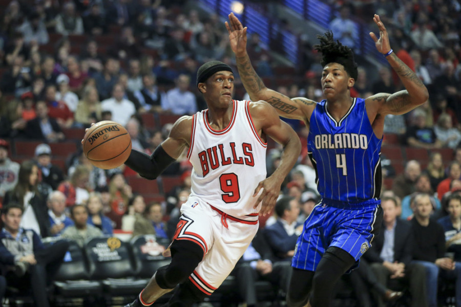 Chicago IL USA- Chicago Bulls guard Rajon Rondo drives past Orlando Magic guard Elfrid Payton during the first half on Monday Nov. 7 2016 at the United Center in Chicago Ill