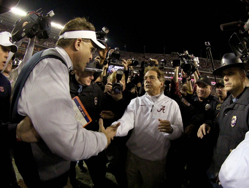 Nov 29 2014 Tuscaloosa AL USA Alabama Crimson Tide head coach Nick Saban shakes hands with Auburn Tigers head coach Gus Malzahn after defeating the Tigers 55-44 at Bryant Denny Stadium. Mandatory Credit Marvin Gentry-USA TODAY Sports