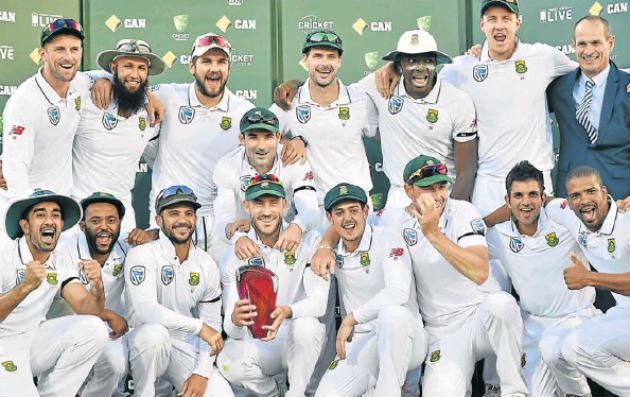 TROPHY TIME The South Africa cricket team celebrate with the trophy after beating Australia in the series at the end of the third test between Australia and South Africa at the Adelaide Oval yesterday