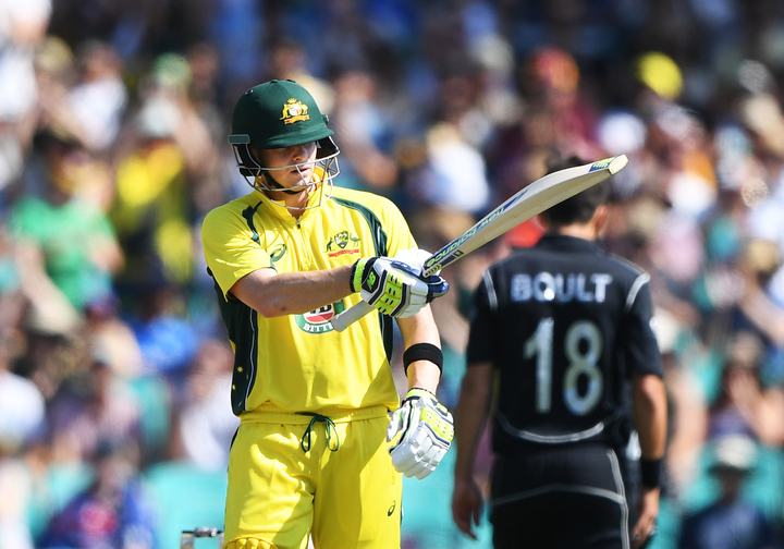 Australian captain Steve Smith celebrates his 50 in the first ODI in Sydney on 4 December 2016