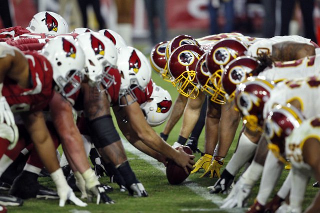 The Washington Redskins and the Arizona Cardinals line up during the second half of an NFL football game Sunday Dec. 4 2016 in Glendale Ariz. The Cardinals won 31-23