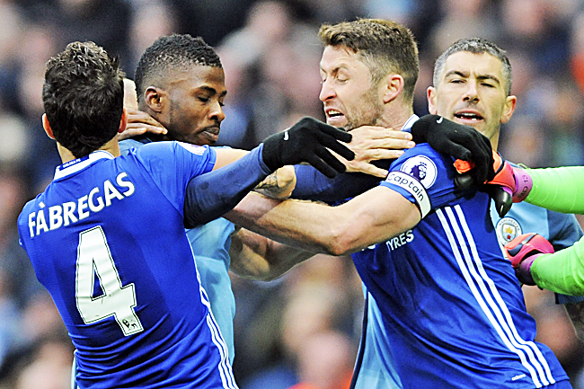 Chelsea and Manchester City players argue after Aguero’s lunge at Luiz.- AP