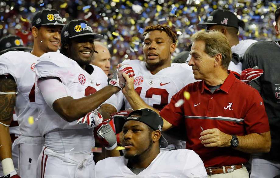 ATLANTA GA- DECEMBER 03 Head coach Nick Saban of the Alabama Crimson Tide celebrates with his team after their 54 to 16 win over the Florida Gators in the SEC Championship game at the Georgia Dome