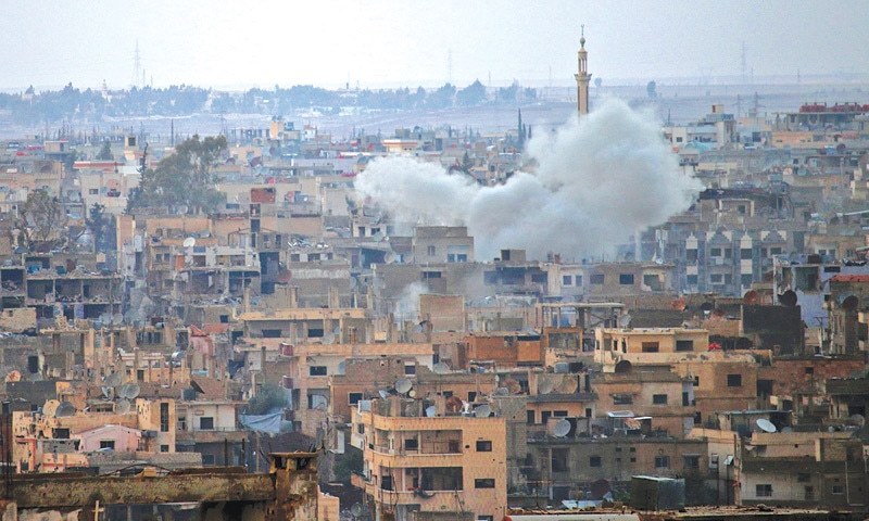 Daraa Smoke billows following a reported air strike by Syrian government forces in a rebel-held area of this city in southern Syria on Friday.—AFP