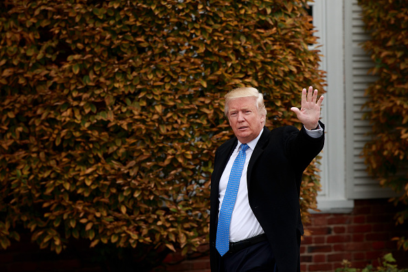 BEDMINSTER TOWNSHIP NJ- NOVEMBER 20 President-elect Donald Trump waves as he arrives at Trump International Golf Club for a day of meetings