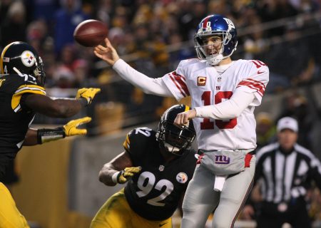 Dec 4 2016 Pittsburgh PA USA New York Giants quarterback Eli Manning throws a pass under pressure from Pittsburgh Steelers linebacker James Harrison and linebacker Lawrence Timmons during the first half at Heinz Field. Mandatory Credi