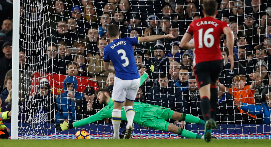 Everton's Leighton Baines scores their first goal from the penalty spot