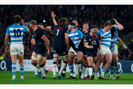 England's Jamie George third right celebrates after England won a penalty in a scrum during the rugby union international between England and Argentina at Twickenham stadium in London Saturday Nov. 26 2016