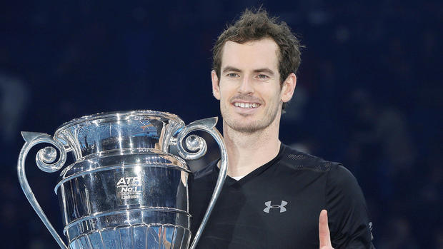 Great Britain’s Andy Murray celebrates with the Year End No. 1 Trophy in London on Sunday. Reuters