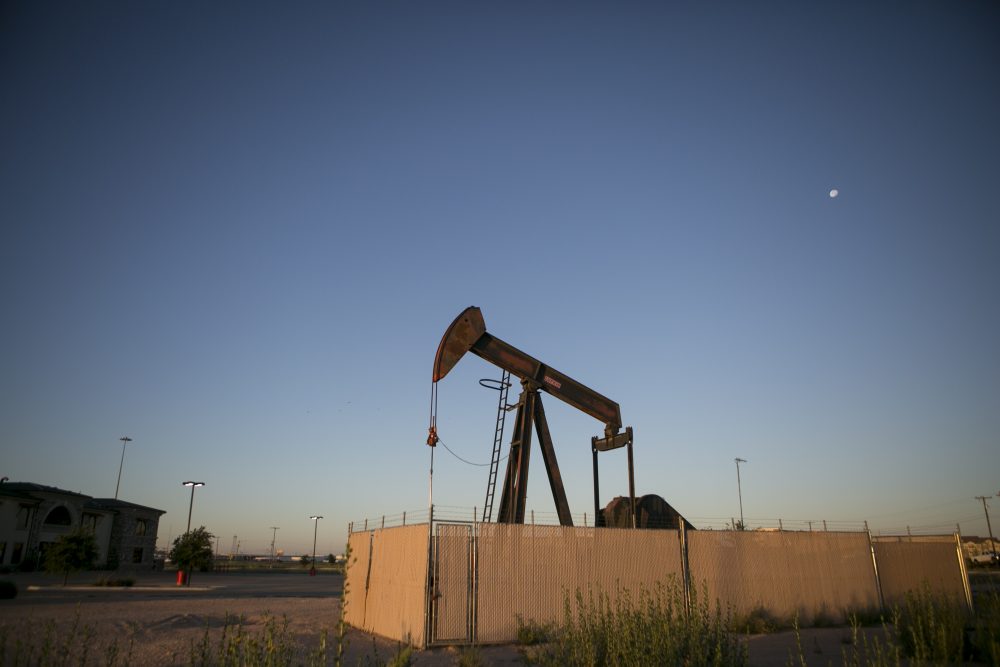 Pump jacks dot the landscape outside Midland a West Texas oil town