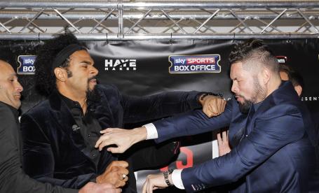 Image Text
 TENSION Heavyweights David Haye and Tony Bellew get it on early