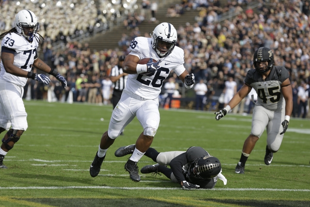 In just his sophomore season Saquon Barkley was named the Big Ten’s top offensive player and top running back. Michael Conroy | AP