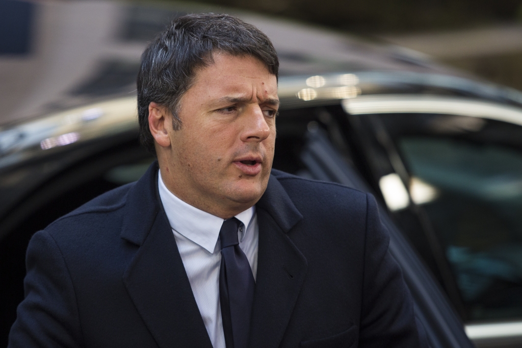 Italian Prime Minister Matteo Renzi arrives at the Council of the European Union on the second day of a two day summit