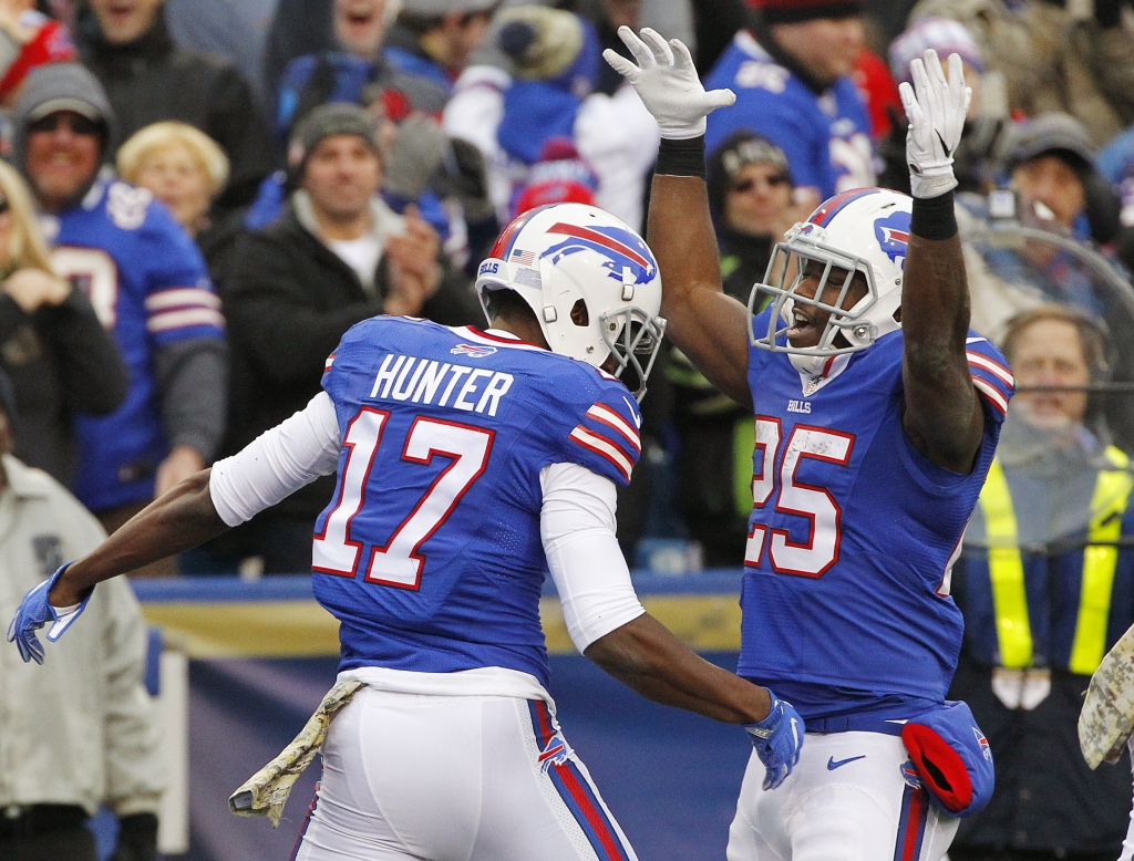 Buffalo Bills running back Le Sean McCoy and Justin Hunter celebrate after Hunter scored a touchdown during the second half of an NFL football game against the Jacksonville Jaguars Sunday Nov. 27 2016 in Orchard Park N.Y. (AP