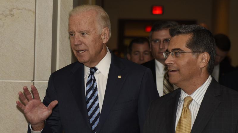 Vice President Joe Biden accompanied by House Democratic Caucus Chairman Rep. Xavier Becerra D-Calif. arrives on Capitol Hill in Washington