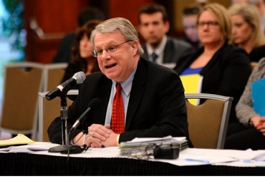 Attorney Mark Brewer who appeared on behalf of Green Party presidential candidate Jill Stein addresses the Michigan Board of State Canvassers regarding Stein's request of a statewide presidential election recount Friday Dec. 2 2016 at the Lansing Cen