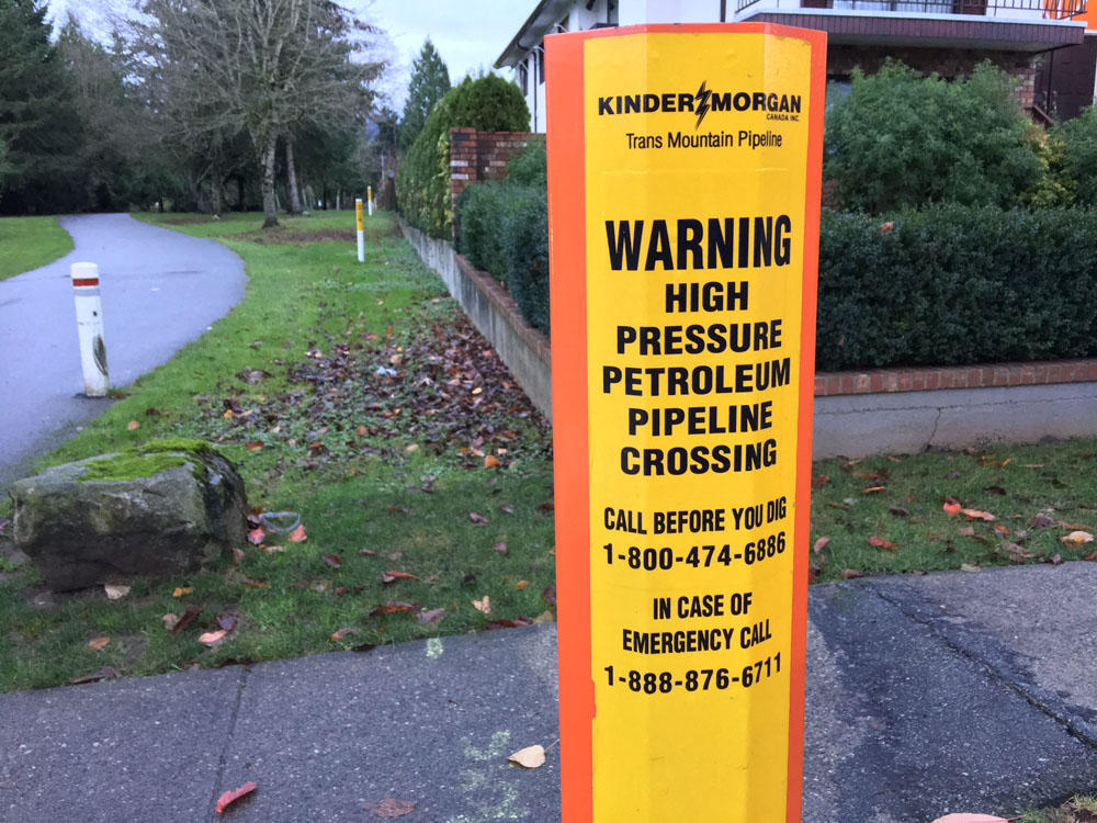 The existing Kinder Morgan pipeline through the Vancouver suburb of Burnaby. Canadian Prime Minister Justin Trudeau has given conditional approval to a controversial expansion of the pipeline which could see an increase to 34 crude oil tankers a month