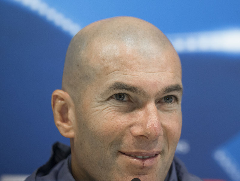 Real Madrid head coach Zinedine Zidane smiles during a press conference after a training session at the Valdebebas camp in Madrid Spain on Tuesday