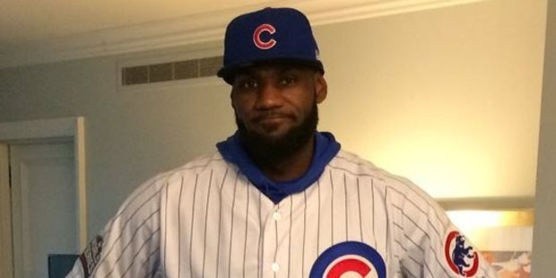 LeBron James was forced to honour his bet with Dwayne Wade today wearing a full Chicago Cubs uniform to their NBA match in Chicago