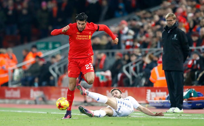 Leeds United's Stuart Dallas right and Liverpool's Emre Can battle for the ball during their English League Cup quarter final match at Anfield Stadium in Liverpool Tuesday Nov. 29