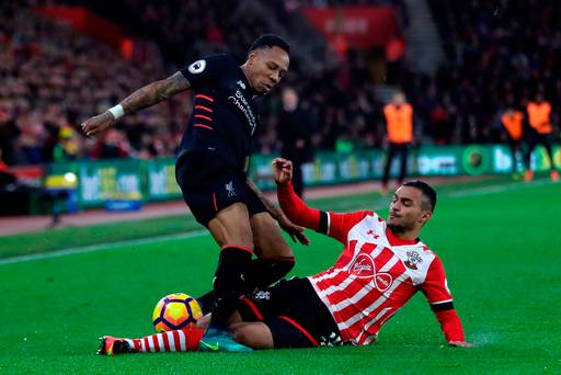 Liverpool's Nathaniel Clyne is challenged by Southampton's Sofiane Boufal