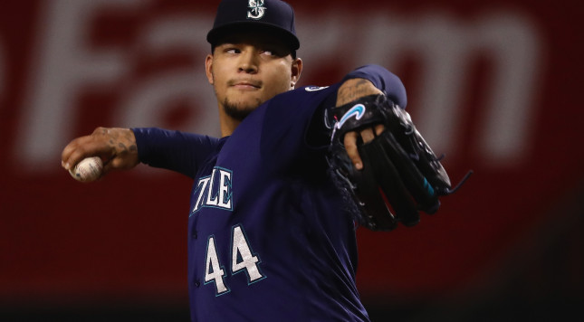 ANAHEIM CA- SEPTEMBER 13 Taijuan Walker #44 of the Seattle Mariners pitches during the first inning of a game against the Los Angeles Angels of Anaheim at Angel Stadium of Anaheim