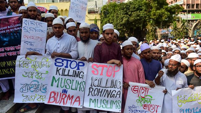 Bangladeshi activists from an Islamic organization protest against the treatment of Rohingya Muslims in Myanmar in Dhaka