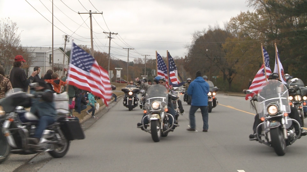 Holiday parade collects toys for children in need