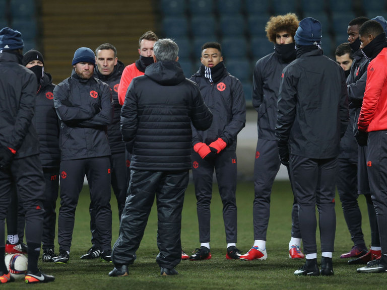 Jose Mourinho speaks to his players at Chornomorets Stadium