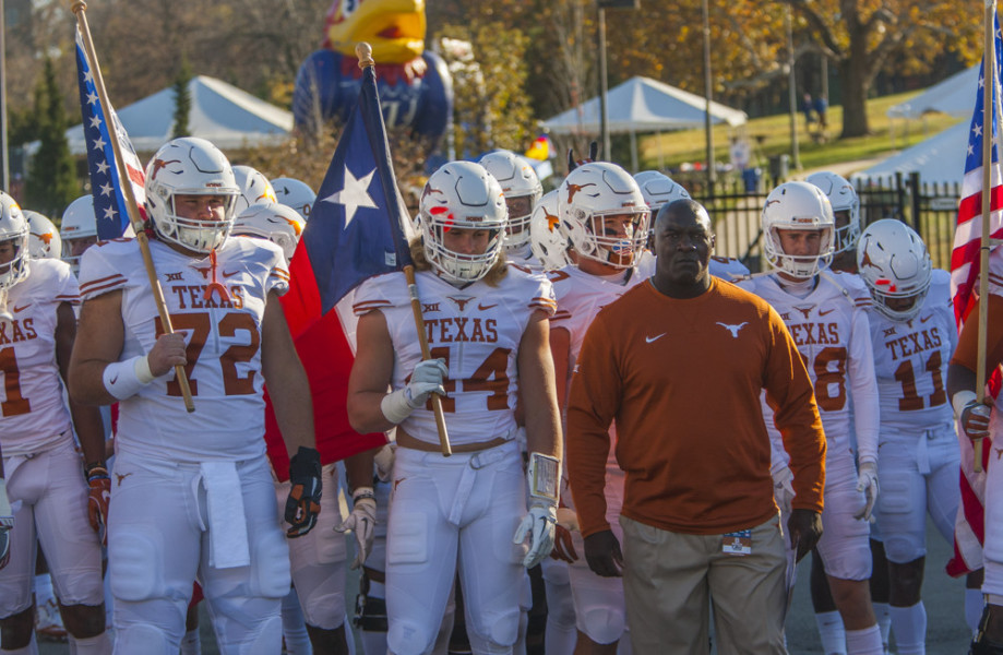 LAWRENCE KS- NOVEMBER 19 Head Coach Charlie Strong and the Texas Longhorns prepare to take the field before the game against the Kansas Jayhawks