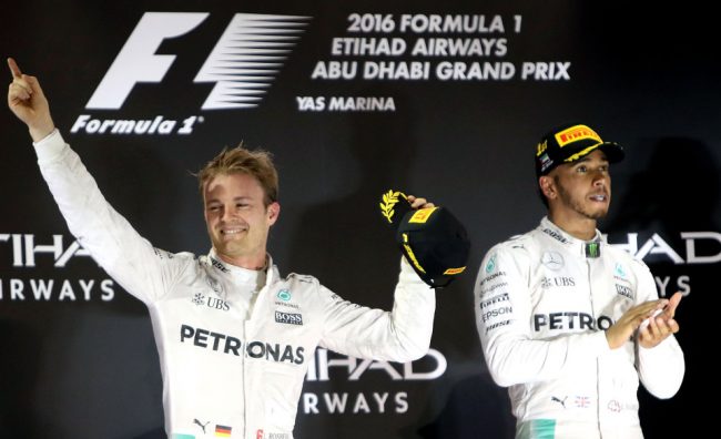 Nico Rosberg celebrates with Lewis Hamilton