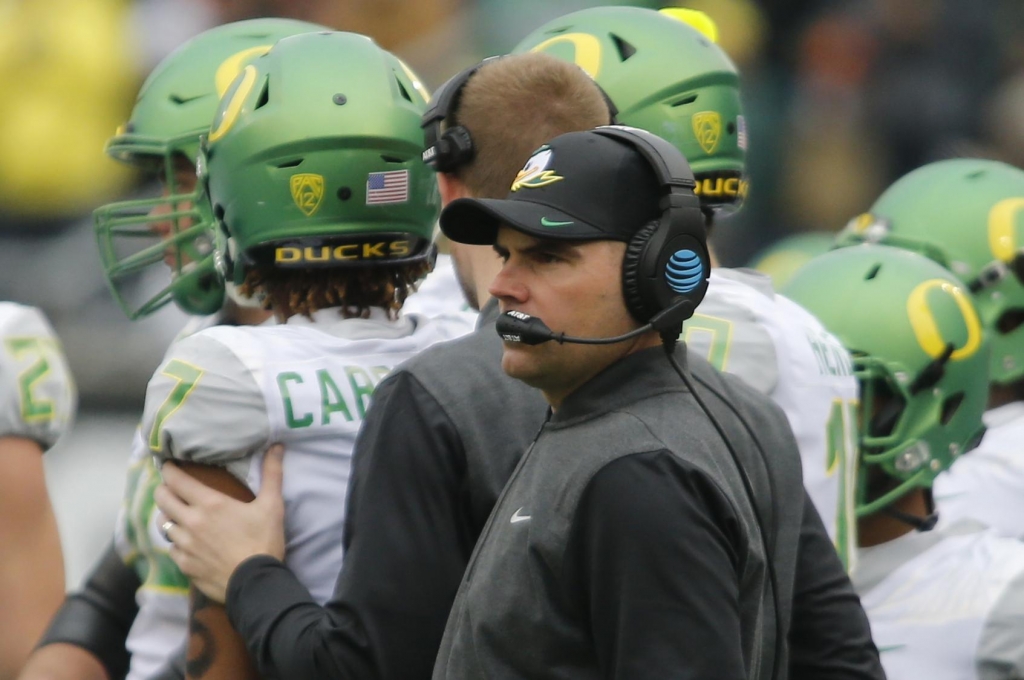 Oregon fired head football coach Mark Helfrich on Tuesday