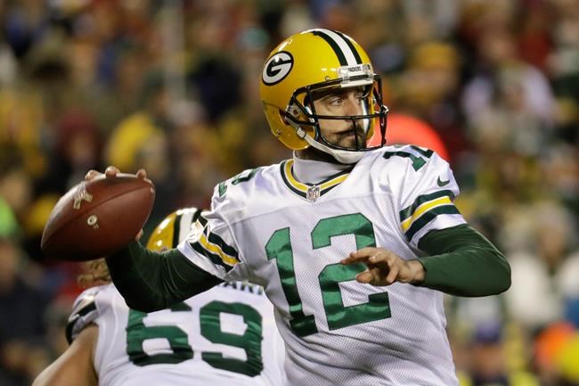 Green Bay Packers quarterback Aaron Rodgers passes the ball during the first half of an NFL football game against the Washington Redskins in Landover Md. Rodgers is confident the Green Bay Packers can