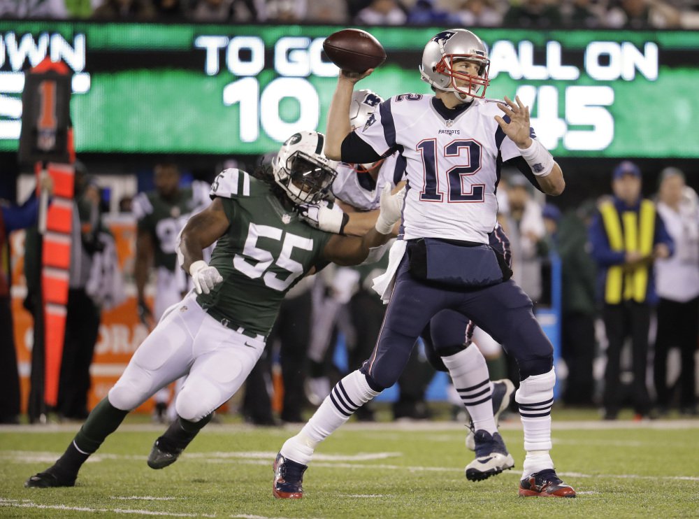 It was a day of milestones for Patriots quarterback Tom Brady who got his 200th career win and also surpassed the 60,000-yard passing mark for his career while leading New England to a 22-17 win over the Jets