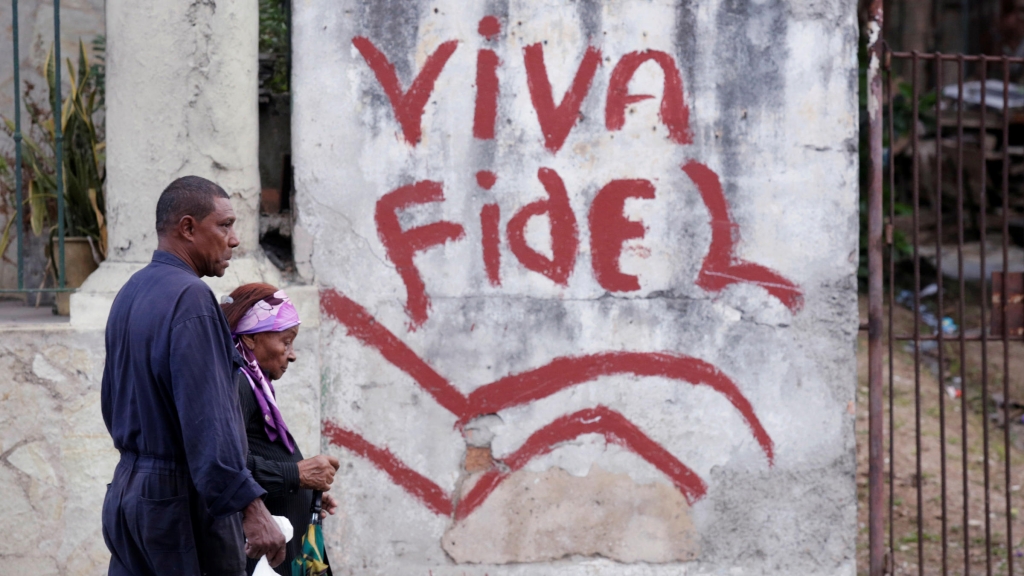 People walk past graffiti that reads'Long live Fidel in Havana Cuba on Nov. 26 2016.
   Enrique De La Osa  Reuters