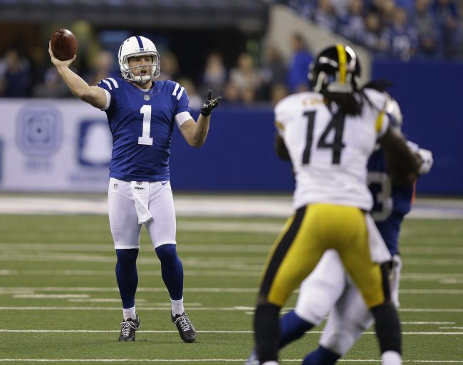 Indianapolis Colts punter Pat Mc Afee throws a pass for a first down during the first half of the team's NFL football game against the Pittsburgh Steelers Thursday Nov. 24 2016 in Indianapolis