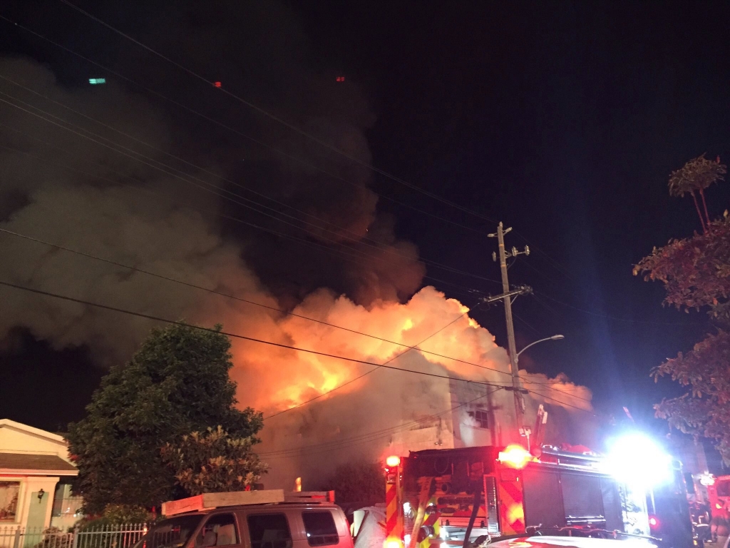 Plumes of smoke were seen issuing from the warehouse after the blaze broke out in Oakland California