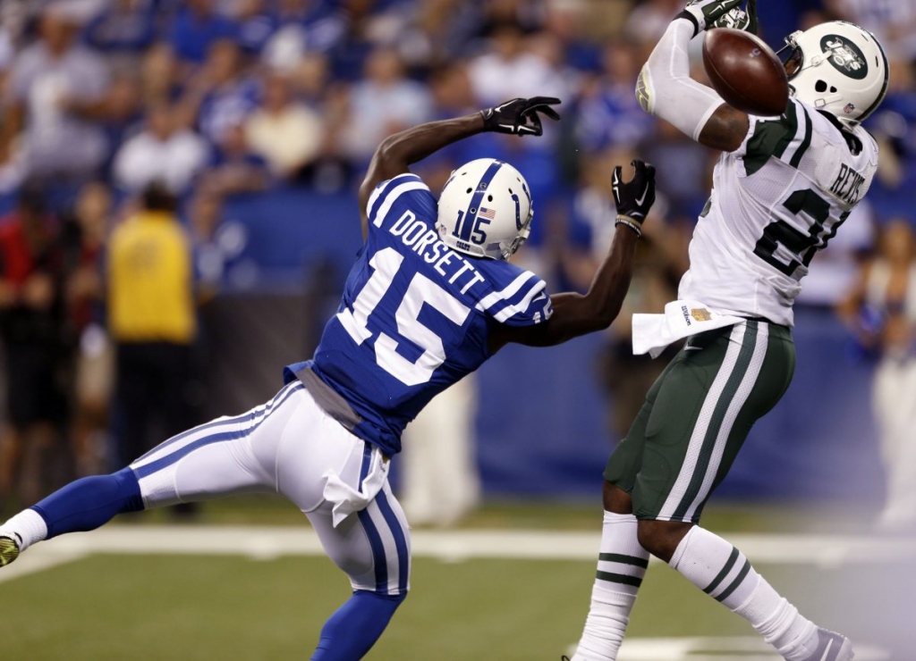 Sep 21 2015 Indianapolis IN USA New York Jets cornerback Darrelle Revis breaks up a pass intended for Indianapolis Colts wide receiver Phillip Dorsett at Lucas Oil Stadium. New York Jets defeat the Indianapolis Colts 20-7. Mandatory Credit