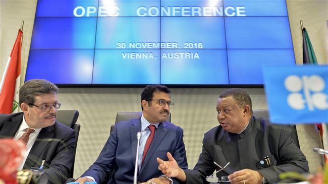 OPEC Secretary General Nigerian Mohammed Barkindo, the Chairman of the OPEC Board of Governors Algerian Mohamed Hamel and the President of the Organisation of Petroleum Exporting Countries Mohammed bin Saleh al Sada attend a meeting