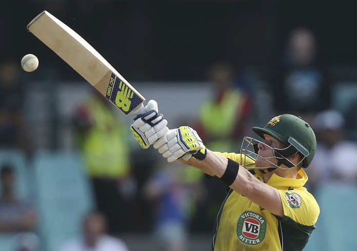 Australia's Steven Smith plays at a high ball against New Zealand during their one day international cricket match in Sydney Australia Sunday Dec. 4