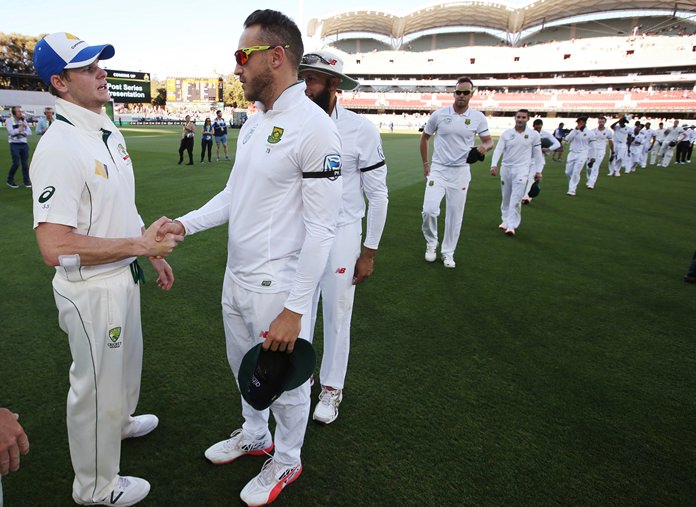 Australia's Steven Smith left and South Africa's Faf du Plessis second left shake hands at the end the third test match in Adelaide Australia Sunday Nov. 27