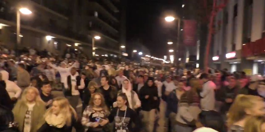 Students flee police spraying tear gas after Penn State's victory over Wisconsin