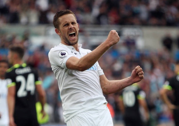 Swansea's Gylfi Sigurdsson celebrates after scoring in a 2-2 draw against Chelsea in September