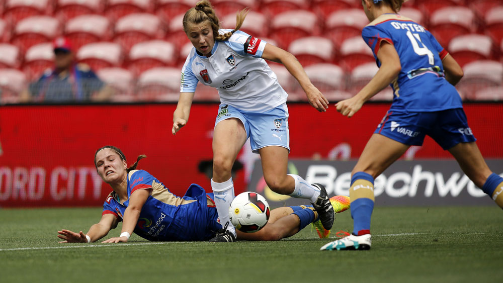 Sydney FC player Remy Siemsen in action against Newcastle